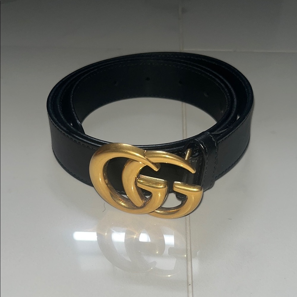 Gucci Black and Gold Leather Belt with Iconic GG Buckle